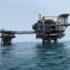 Offshore production platform and bridge-linked wellhead platform with flare